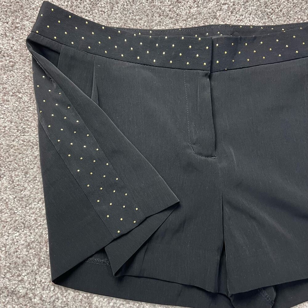 Black Express shorts with gold stud details size 6